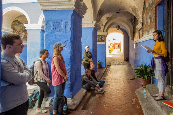 In Honors Passport, classes take place on site. Here, Linh Luu presents at the Santa Catalina Monastery in Arequipa.